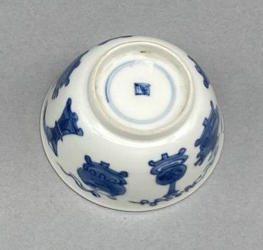 Small tea bowl and its saucer in blue and...