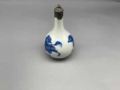 Bottle aspersorium in blue and white porcelain...