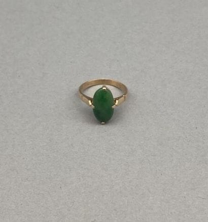 Bague en or 18 K (750 °/°°) sertie d'un petit...