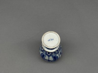Small blue and white porcelain vase called...