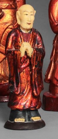 Two polychrome wood sculptures depicting...