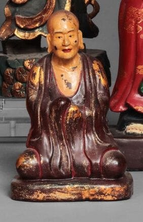 Two polychrome wood sculptures depicting...
