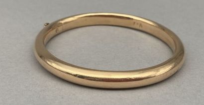 Bracelet jonc rigide articulé en or 14 K...