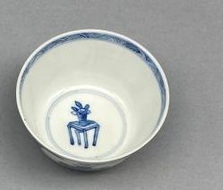 Small tea bowl and its saucer in blue and...
