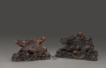 Small buffalo guards. Two groups in carved...