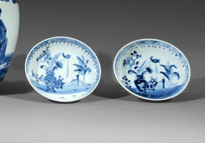 Suite of four circular hollow cups in porcelain....
