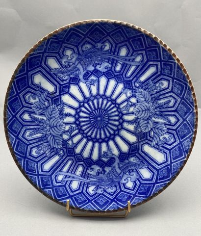 Set of three circular porcelain dishes. Printed...