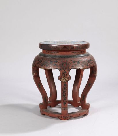 Circular pedestal in cinnabar red and black...