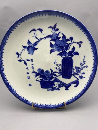 Set of three circular porcelain dishes. Printed...
