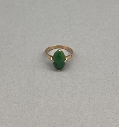 Ring in 18 K gold (750 °/°°) set with a small...