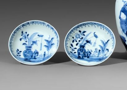 Suite of four circular hollow cups in porcelain....