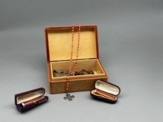 
Lot including:

- A silver and ivory metal...