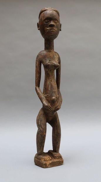 Lot including : 

- A hardwood statue with...