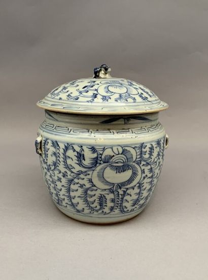 Covered pot with a flared body in porcelain....