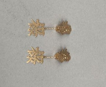 Pair of ear clips forming pendants in 18...