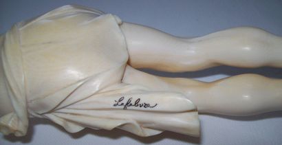 *Finely carved and partially openworked ivory...