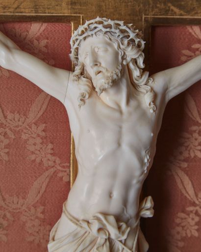 *Finely carved and partially openworked ivory...