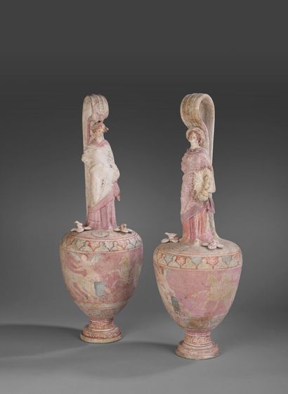 Pair of pseudo-aiguières with ribbon handles...