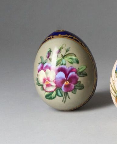 Blue porcelain EGG centered with a polychrome...