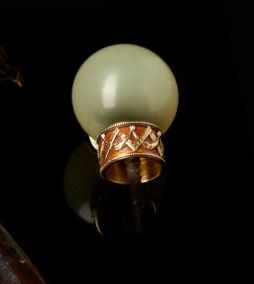 MAISON FABERGÉ. 14K (585°/°°) gold, tubular-shaped...