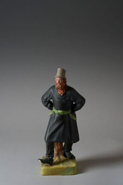 Polychrome bisque FIGURINE featuring a dancing...