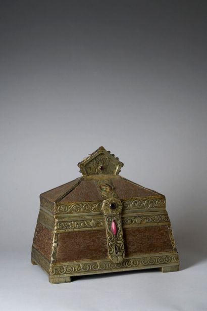 Wooden box, rectangular in shape, resting...