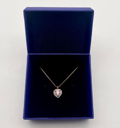 SWAROVSKI.
Pendentif en métal doré, modèle...