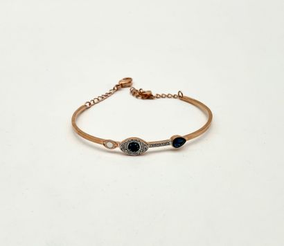 SWAROVSKI.
Bracelet en métal doré, modèle...