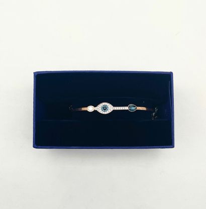 SWAROVSKI.
Bracelet en métal doré, modèle...