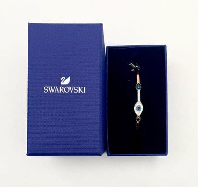 SWAROVSKI.
Bracelet en métal doré, modèle...