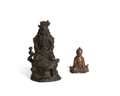 Guanyin statuette in red and gold lacquered...