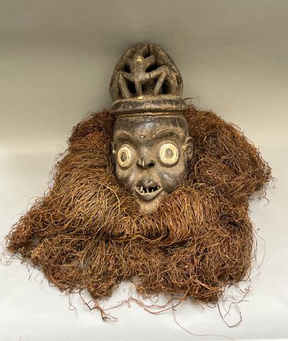 Old wooden helmet mask with openwork cap...