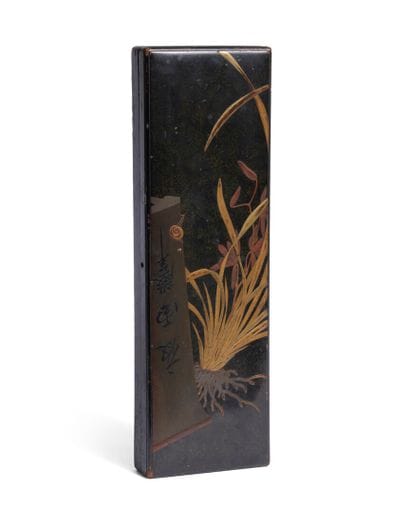 Black lacquer glove box with takamaki-e decoration...