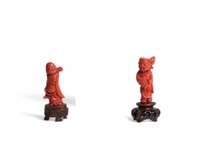 Reunion of two carved red coral subjects,...