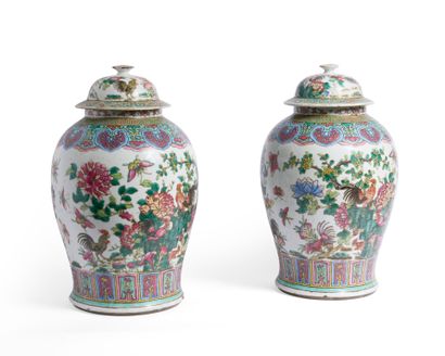 A set of two porcelain vases with polychrome...