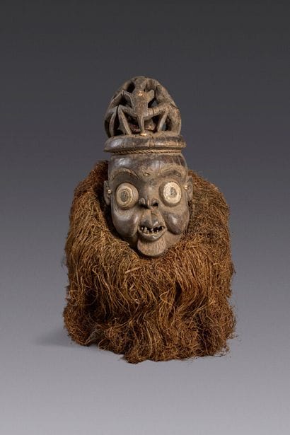 Old wooden helmet mask with openwork cap...
