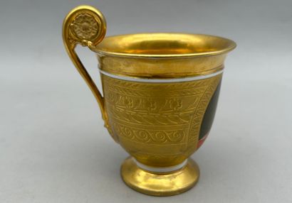 A domed porcelain cup on a cylindrical base...