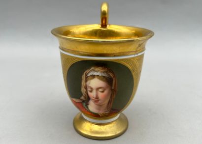 A domed porcelain cup on a cylindrical base...