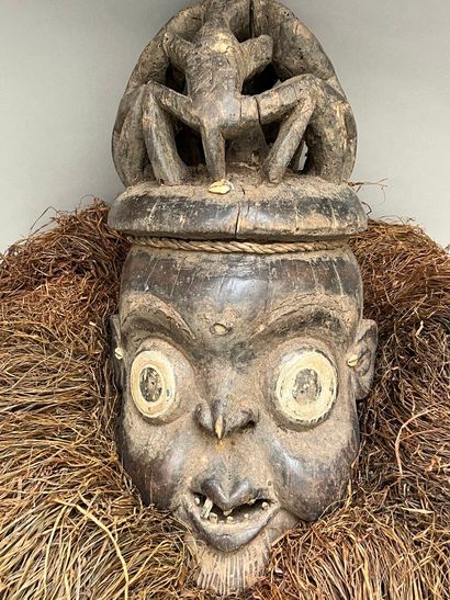 Old wooden helmet mask with openwork cap...