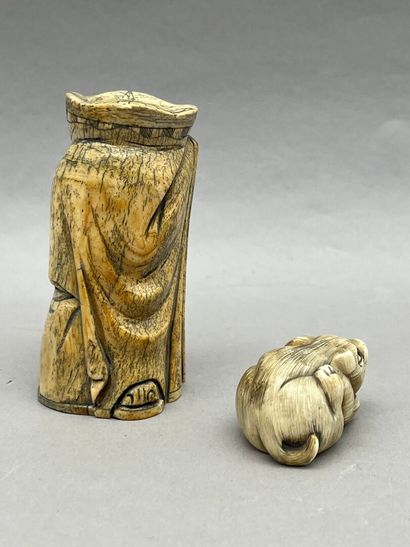 Lot including:
- A statuette representing...