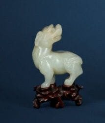 Celadon jade subject depicting a qilin, head...