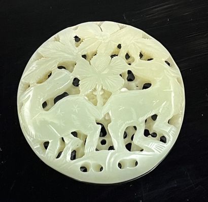 Celadon nephrite jade medallion with carved...