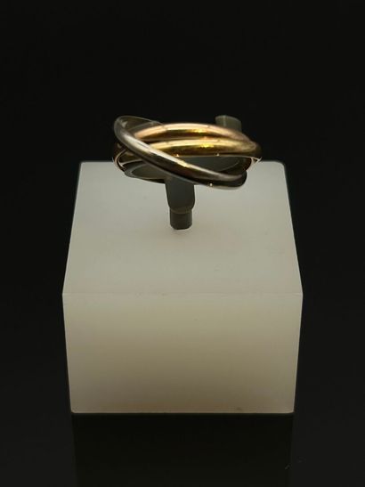 Dans le goût de CARTIER. Modèle Trinity.
Bague,...
