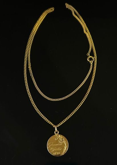 Médaille en or 18K (750°/°°), gravée 