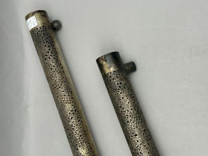 Meeting of two silver handles with openwork...