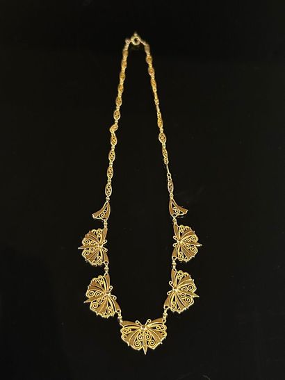 Collier en or jaune 18 K (750°/°°), à mailles...