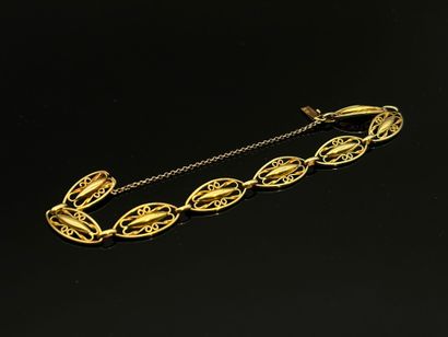 Bracelet en or jaune 18K (750°/°°), à mailles...