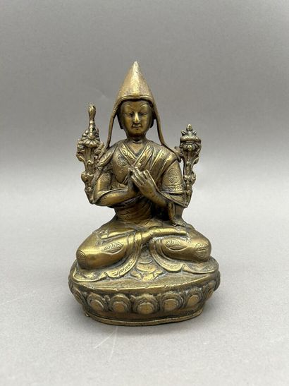 Lot including: 
- Adorned Buddha, gilded...