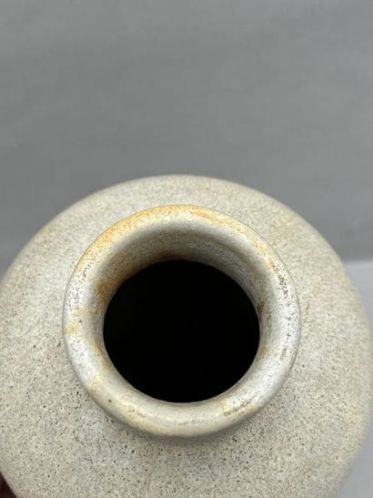 Beige glazed stoneware vase with short hemmed...