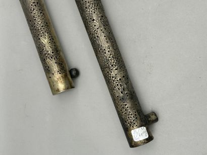 Meeting of two silver handles with openwork...